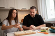 © yta - family dinner, father and daughter preparing food for the holiday, preparing bread for the meal