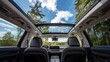 © THESUN - The large sunroof in the SUV offers a view of the clear sky.