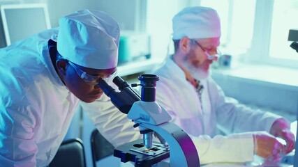 Wall Mural - research team analyzing chemical innovations in modern laboratory