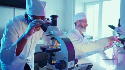 Wall Mural - innovative researchers analyzing chemicals in laboratory with advanced technology