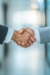 © YURIMA - A handshake symbolizes mutual agreement and dedication between professionals, emphasizing the importance of effective communication, trust, and respect for successful business collaboration