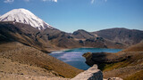 View of Tama Lake and Ngauruhoe Mountain covered with snow, New Zealand