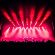 © Create31@Design - Dramatic photo of a concert stage with intense colored lights, high contrast, dynamic performance shot