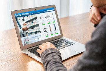 on pharmacy online store on computer screen for shopping for medical products drugs and medicine snugly