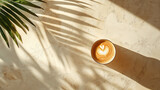 Lungo coffee in a chic cafe with lush fronds, top-down view from above, bright sunlight, fair trade, eco-friendly, natural ambiance