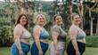 © bluebeat76 - Four curvy women smiling and showing body positivity outdoors