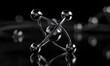 © Kartika - A black and silver ball with four other balls surrounding it