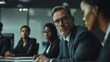 © Julia - Male mature caucasian ceo businessman leader with diverse coworkers team, executive managers group at meeting. Multicultural professional businesspeople working together on research plan in boardroom.