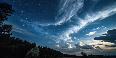 Wall Mural - Swirling clouds of night sky with stars scattered across a dark blue background, cosmos, astronomy