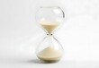 © TigerDude - The hourglass is filled with sand, symbolizing the passage of time on a white background. Minimal concept.