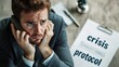 © pkproject - Anxious Business Manager on a Phone Call with Crisis Protocol Document
