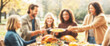 © Pathi - Blurred background of a feast for the eyes and the stomach at this outdoor Thanksgiving celebration, thanksgiving day, food sharing
