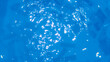 © Omri - Bubbles and seething water in the light of sunlight.Blue water texture.