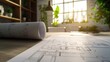 © Chandlerlikes - Architect rolls and architectural plan with technical project drawings, highlighting a professional planning and design environment.