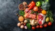 © Juan - Assortment of raw meat and fresh produce on dark background