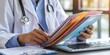 © CreativeSeven  - Healthcare worker organizing patient files into color-coded folders medical office action shot indoor setting close-up view efficient documentation