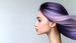 © Koh's Smart - A stunning single deep purple hair strand stands out against the clean white background in this captivating photo.