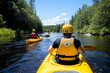 © Sanchai - Kayakers paddling down a calm river with tree-lined banks on a sunny summer afternoon