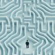 © carolina - businessman stands facing a complex maze pattern, symbolizing challenges and decision-making in professional life.