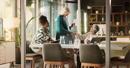 Aufkleber - Teamwork, women and business people in office, handshake and planning for project. Partnership, creative agency and group in meeting, discussion and welcome with greeting, cooperation and feedback
