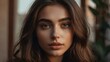 © Saud - A close-up portrait of a young woman with long hair and striking features, highlighting her beauty in soft natural light
