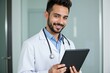 © NeedMoreMars - Smiling Doctor Holding Tablet in Modern Medical Office, Ideal for Healthcare Marketing, Medical Profession Promotions, and Medical Education Materials