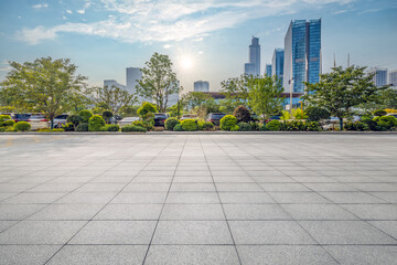 Fototapete - Empty parking lot floor and modern city buildings background