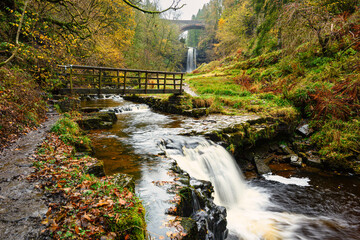 Wall Mural - cascade and footbridge below ashgill force, located near garrigill, cumbria in the north pennines ao