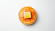 © Owl.Studio - Fresh bake and grill, Freshly made pancake topped with square of butter and syrup, perfect for breakfast. Enjoy deliciousness of this classic dish!