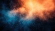 © Manisara - Abstract hot cold cosmic cloud of orange and blue particles in gradient background.