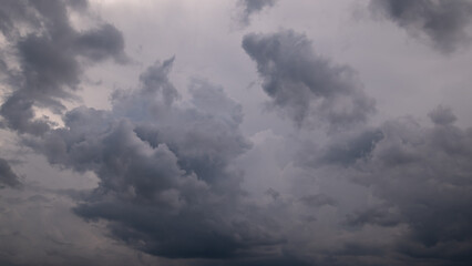 Wall Mural -  Dark sky with stormy clouds. Dramatic sky rain,Dark clouds before a thunder-storm.