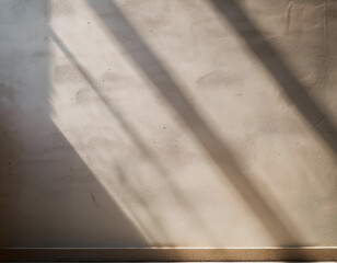 Leinwandbilder - A close-up of a white wall with diagonal shadows cast by sunlight streaming through a window.