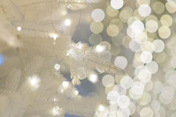 Wall Mural - merry christmas and new year holidays background. blurred bokeh background with light bulbs and chri