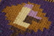 © Design - Detail of weaving rug with violet fabric and golden flower in bassarabian style