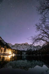 Wall Mural - Cold starry night at the lakes of Fusine