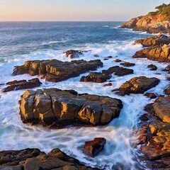 Wall Mural - a beautiful shot of a rocky shore with a beautiful sea in a sunset