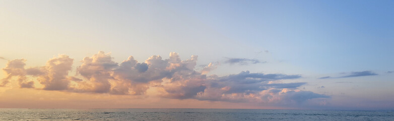 Wall Mural - panoramic view of a pastel sky at sunset. sky panorama background