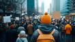 © eshana_blue - Protester walking in demonstration, holding blank protest sign in urban environment