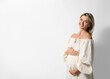 © New Africa - Portrait of beautiful pregnant woman on white background, space for text