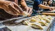 Traditional Chinese Dumplings Being Made in a Vibrant Restaurant Kitchen in Xi’an, Showcasing the Rich Culinary Heritage and Food Culture of China’s Ancient Capital City