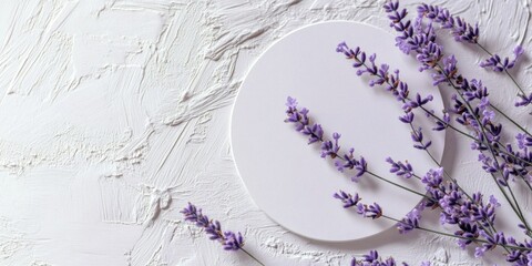 Wall Mural - A still life image of purple flowers arranged on a white plate