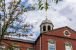 A view of Harvard Hall and its cupola at Harvard University on an autumn day in Cambridge, Massachusetts, USA