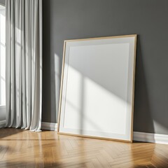 An empty poster frame stands against the grey colour wall on the wooden flooring, Interior mock-up template 3d illustration.