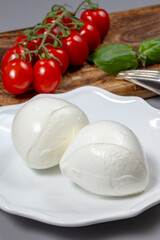 Wall Mural - Tasty italian food, fresh white buffalo mozzarella soft cheese balls from Campania close up