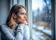 © Yauhen - depression - seasonal affective disorder mental health woman sad comtemplative looking out the window alone