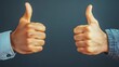 © Intelligent Horizons - Two hands giving thumbs up gesture symbolizing teamwork encouragement and positive reinforcement among colleagues partners or friends  Concept of support agreement praise