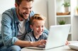 © Pete - Happy father, son using laptop together at home. Sitting on couch, smiling. Son pointing on laptop. Father watching with smile. Family moments of joy, togetherness in cozy home. Modern digital tech