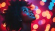 © BlackBird Studio - Joyful Woman Illuminated by Colorful Lights in a Dreamy Atmosphere