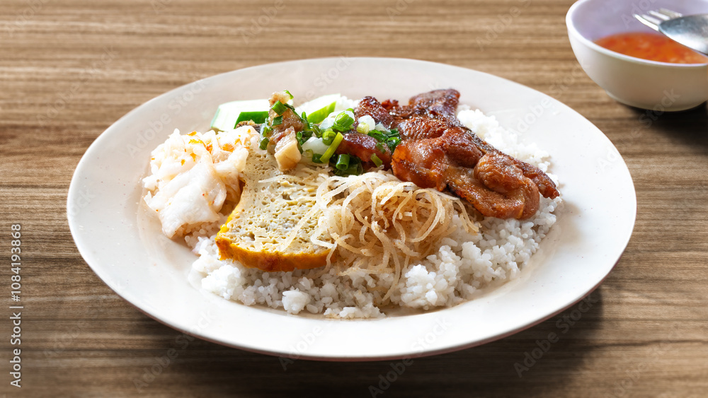 Broken rice with grilled pork chop, meatloaf and shredded pork skin ...