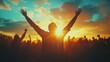 © Thanos - Silhouettes of People with Raised Fists at Sunset Representing Freedom and Human Rights